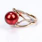Pozlátený Strieborný Prsteň s Červená sladkovodná perlou a Bielym Topásom