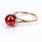 Pozlátený Strieborný Prsteň s Červená sladkovodná perlou a Bielym Topásom