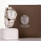 CUSSI dámske hodinky v striebornej farbe s bielym remienkom a s kryštálmi kremeňa okolo ciferníka
